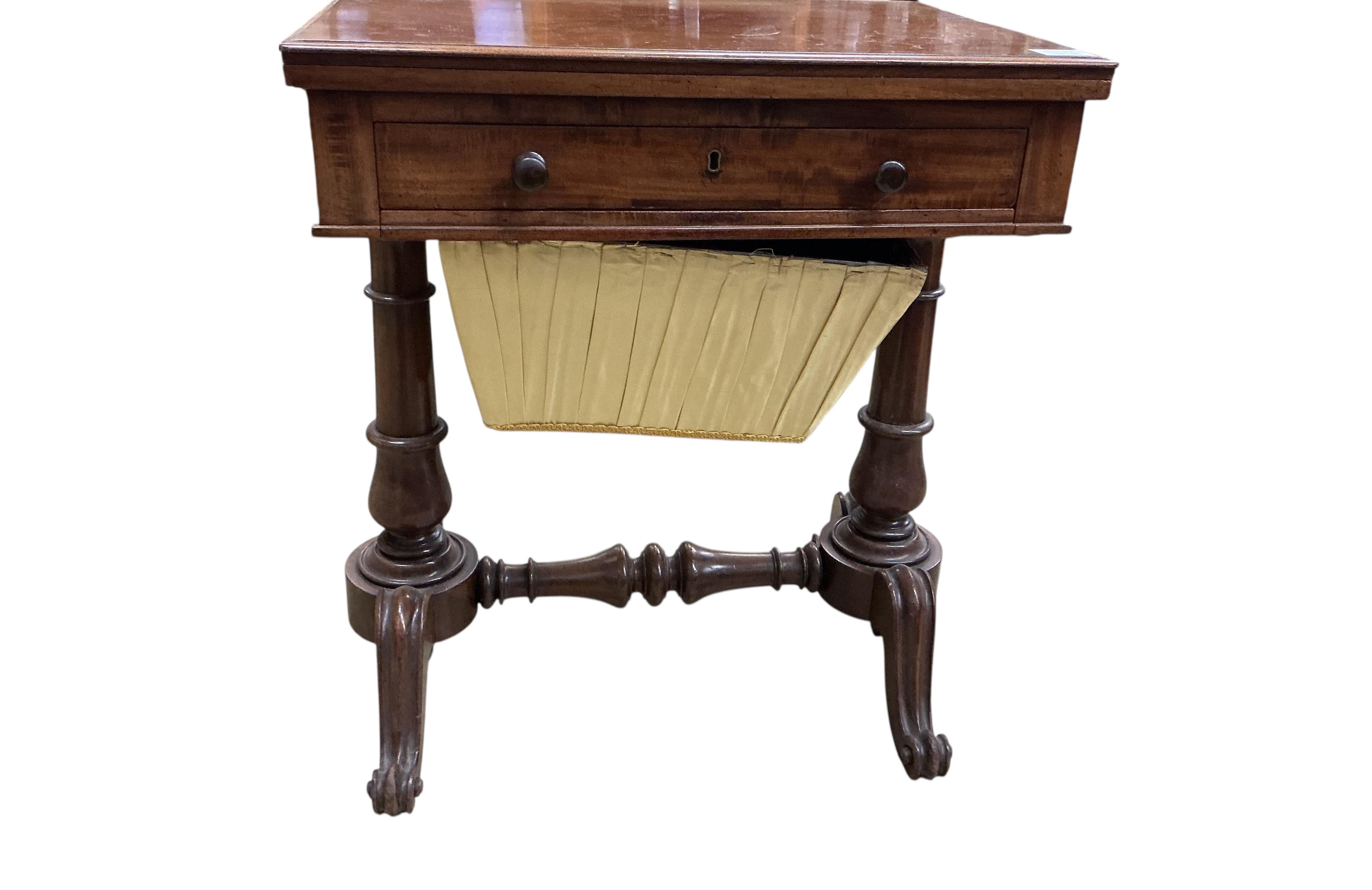 An early Victorian mahogany work / tea table with hinged swivel top, width 60cm, depth 44cm, height 70cm
